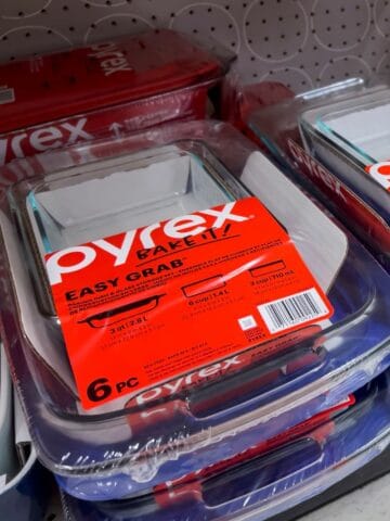 Stack of Pyrex baking dishes on a store shelf