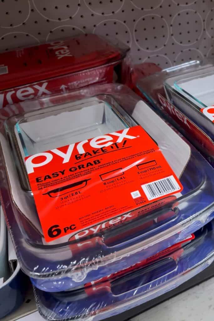 Stack of Pyrex baking dishes on a store shelf