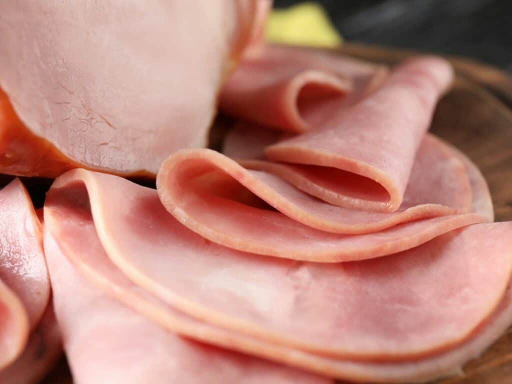 Uncured deli ham sliced into thinly cut slices