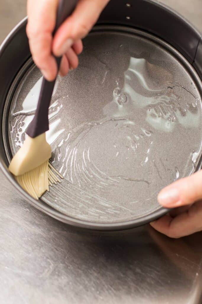 Using a baster to oil a pan with oil