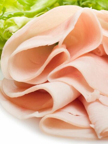 Thinly sliced deli turkey close up