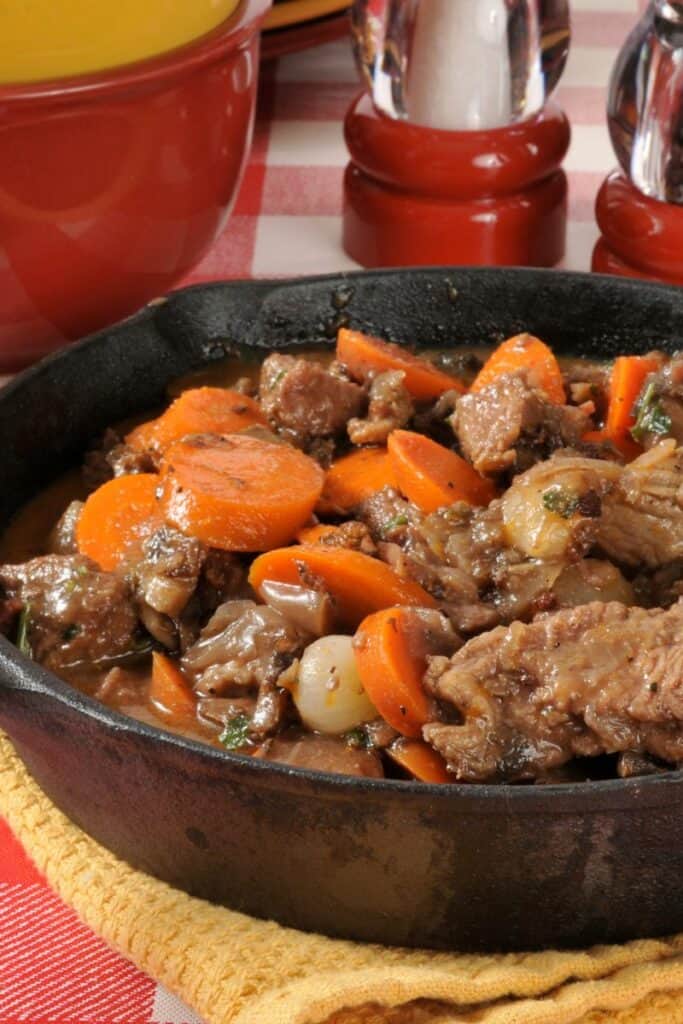 close up of beef stew in a skillet