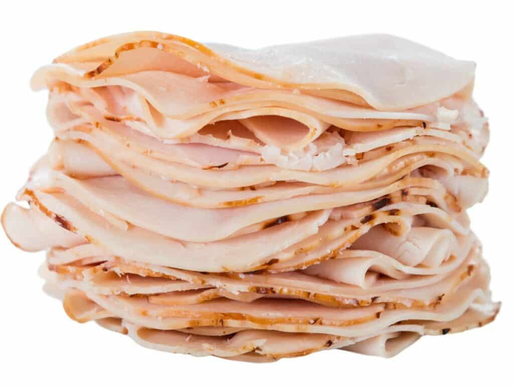 Slices of turkey stacked on top of each other